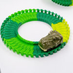 AUTO DINOSAURIO CON PISTA ART 53762 GAO